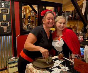 Photo of employees in Halloween costumes-Gina, Sammy