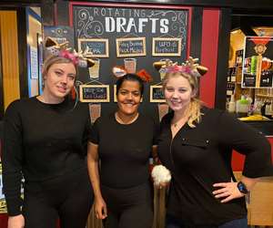 Photo of employees in Halloween costumes-  Jade, Morrigan, Sammy