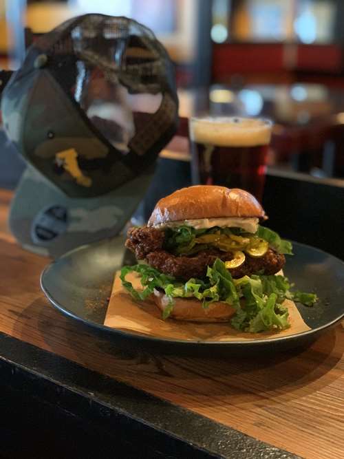 Nashville Hot Sandwich. Hat & beer 